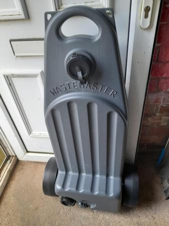 Image 1 of Waste master water container.