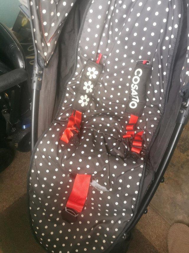 Preview of the first image of Cosatto yo stroller, and rain cover.