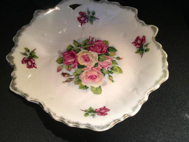Preview of the first image of Geisha fine China plate with roses design.