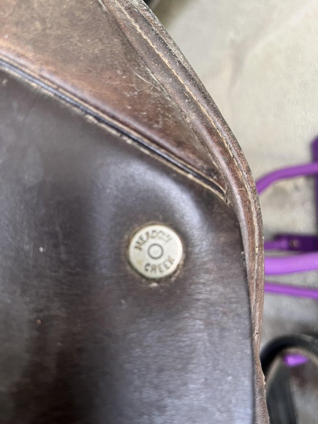 Preview of the first image of Meadow Creek English brown leather saddle.