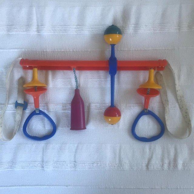 Preview of the first image of Vintage 1981 Kiddicraft Cradle Play colourful plastic rattle.