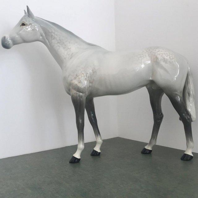Preview of the first image of Vintage 1960s Beswick large glossy grey racehorse.Model 1564.
