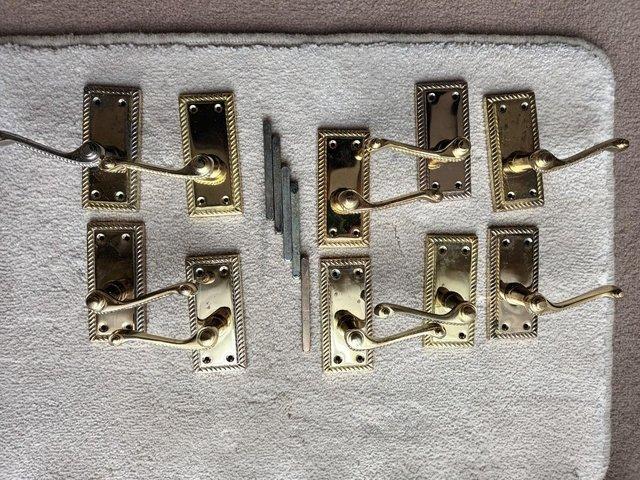 Preview of the first image of 5 Pairs Gold Scroll Door Handles.