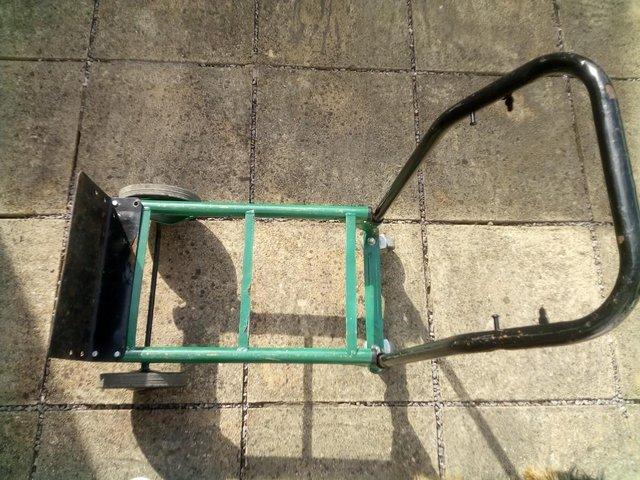 Preview of the first image of 4 WHEEL TROLLEY VERY STRONG HANDLES CAN BE REMOVED CANT FIND.