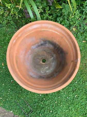 Image 1 of Large weighty terracotta plant pot