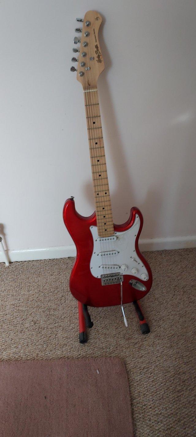 Preview of the first image of Harley Benton Strat guitar with fender gig bag.