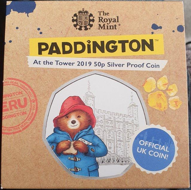 Preview of the first image of R.Mint Paddington At the Tower Silver Proof Coloured 50p.
