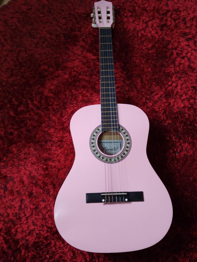 Preview of the first image of Pink 3/4 size guitar with soft case.
