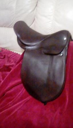 Image 1 of 14" show saddle