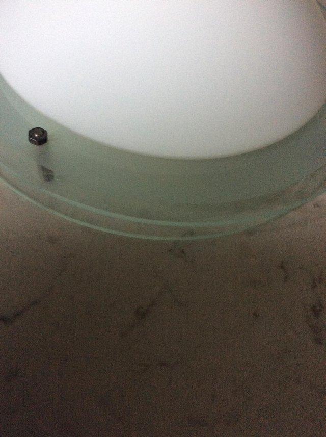 Preview of the first image of Bathroom glass round light fitting.