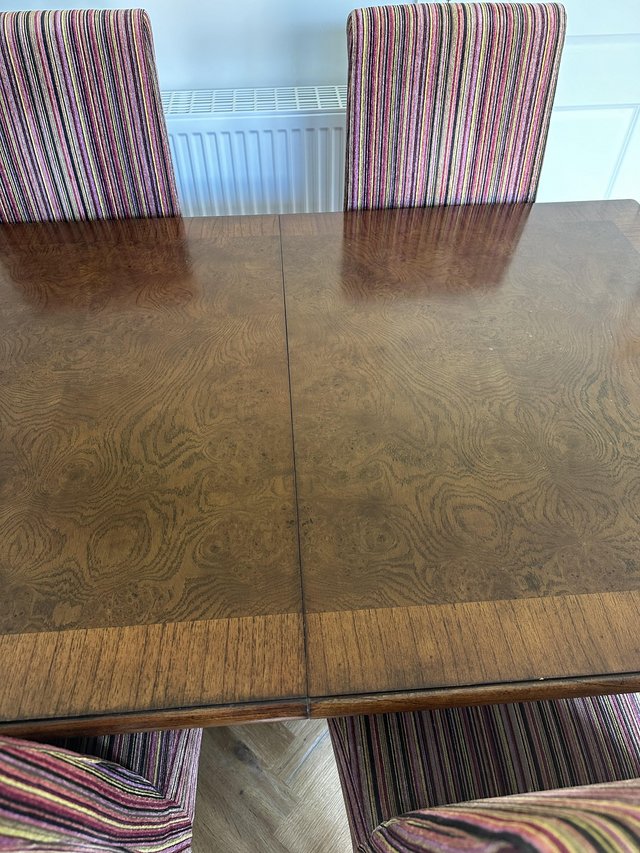 Preview of the first image of Rosewood dining table with 4 chairs.