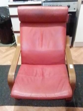 Image 5 of a burgundy poang chair and footstool for sale.