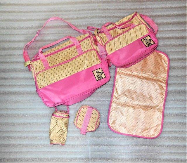 Preview of the first image of ***BABY CHANGING BAGS IN PINK***.
