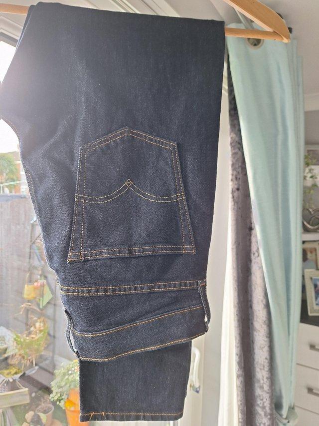 Preview of the first image of Mens blue tapered levi jeans. Brand new never worn..