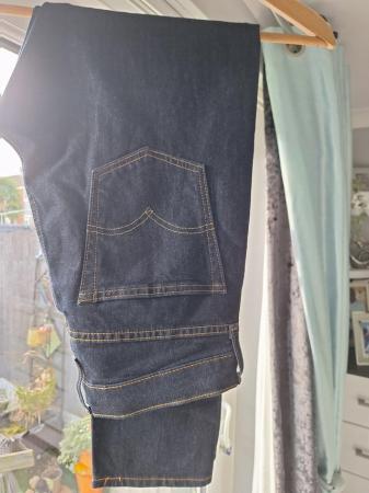 Image 1 of Mens blue tapered levi jeans. Brand new never worn.
