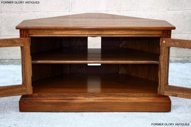 Image 67 of AN ERCOL GOLDEN DAWN ELM CORNER TV CABINET STAND TABLE UNIT
