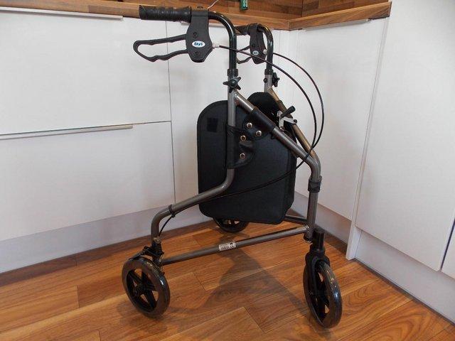 Preview of the first image of NEW Tri Wheel 3-Wheel Lightweight Aluminum Folding Walker.