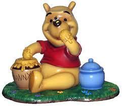 Preview of the first image of Winnie the Pooh statue a lovely piece.