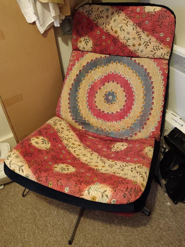 Preview of the first image of Vintage egg chair. Swivel; recovered in vintage kantha quilt.