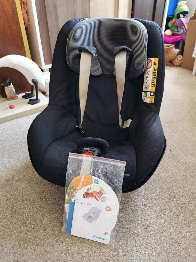 Preview of the first image of Maxi Cosi 2 Way Pearl baby seat.